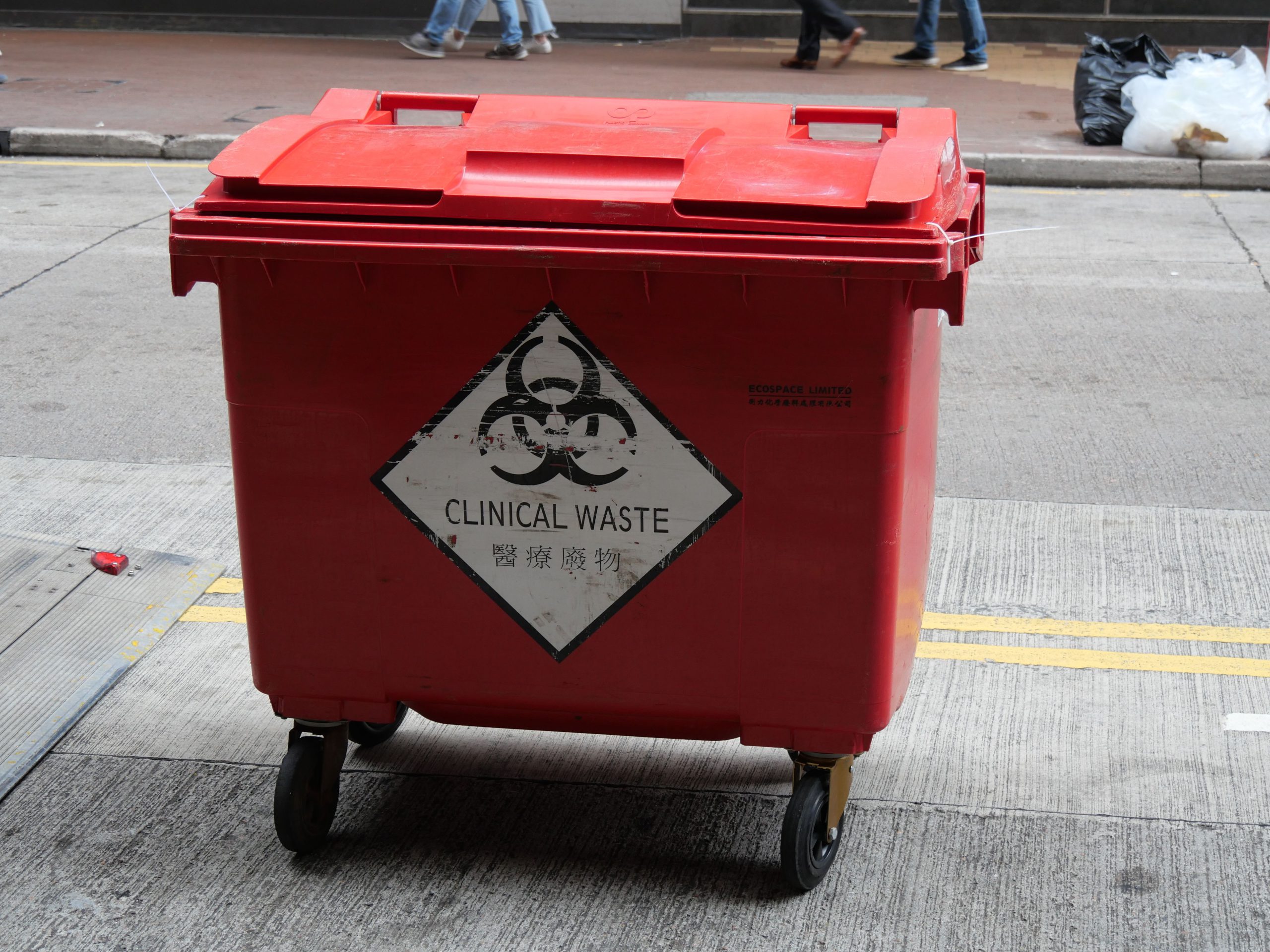 Red biohazard clinical waste bin
